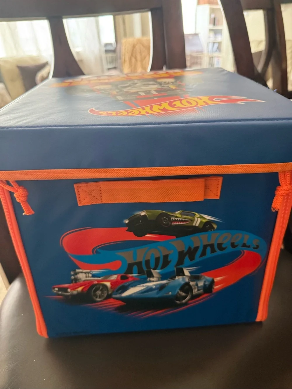 Hot wheels box that unzips as a playmat for cars